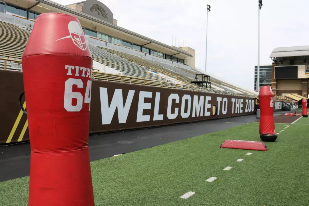 Custom mesh fence scrim that says 'welcome'