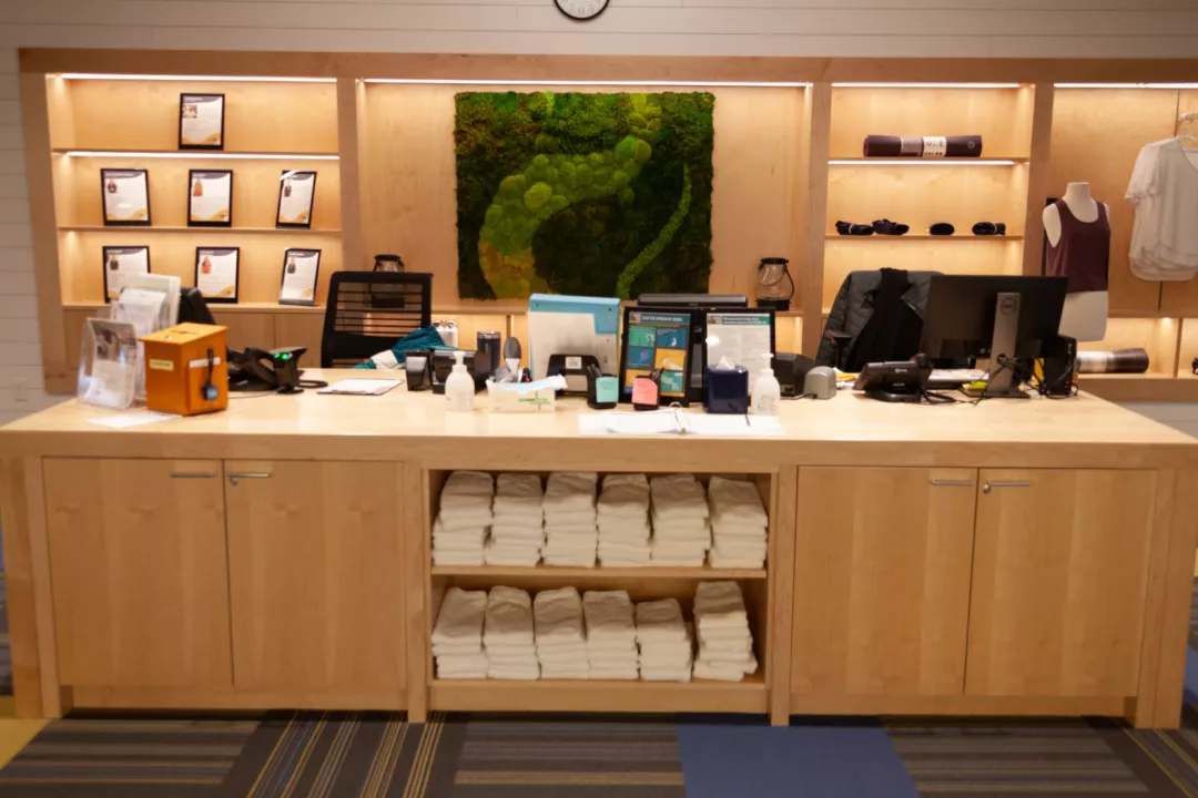 Point of Sale Counter at Bay Harbor Yacht Club | Custom Wooden Checkout Desk and Display Cabinet