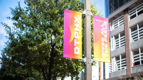 Downtown Phoenix BannerSaver Brackets | Wind Spilling Banner Brackets