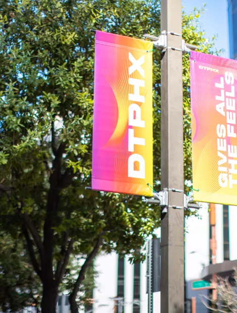 Downtown Phoenix BannerSaver Brackets | Wind Spilling Banner Brackets