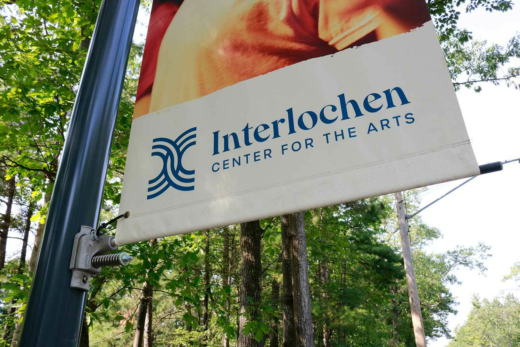 A Custom Light Pole Banner and BannerSaver Bracket for Interlochen Arts Academy