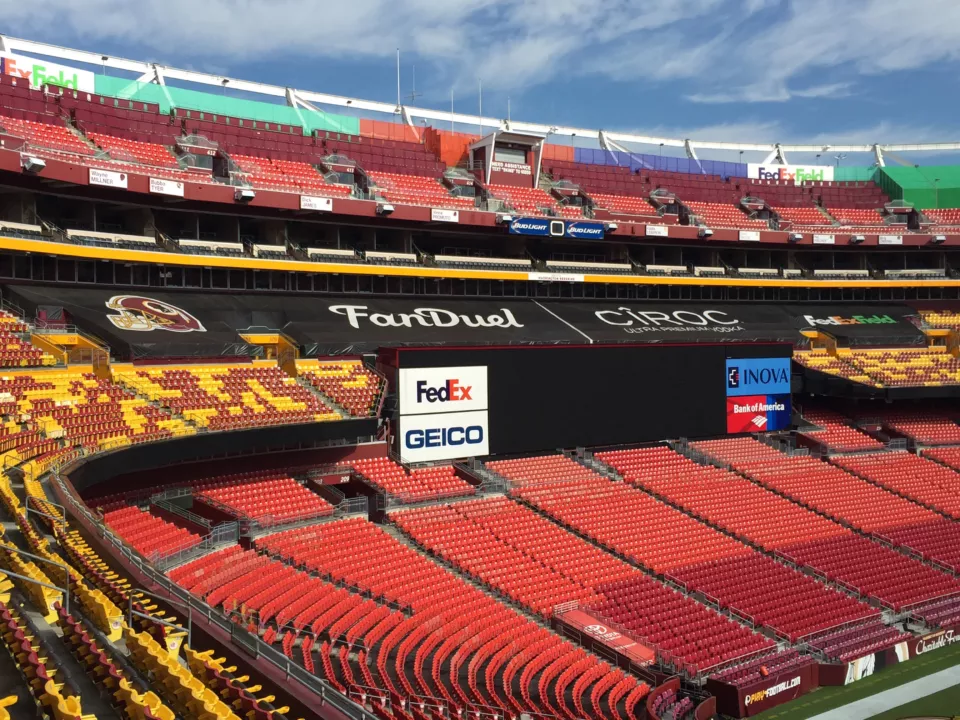 Mesh Banners as Custom Seat Covers for Empty Stadium Seats.