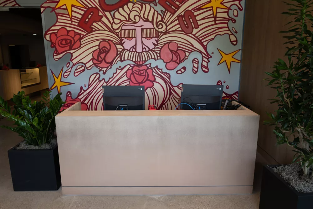 Retail Fixtures | Reception Desk and Backdrop