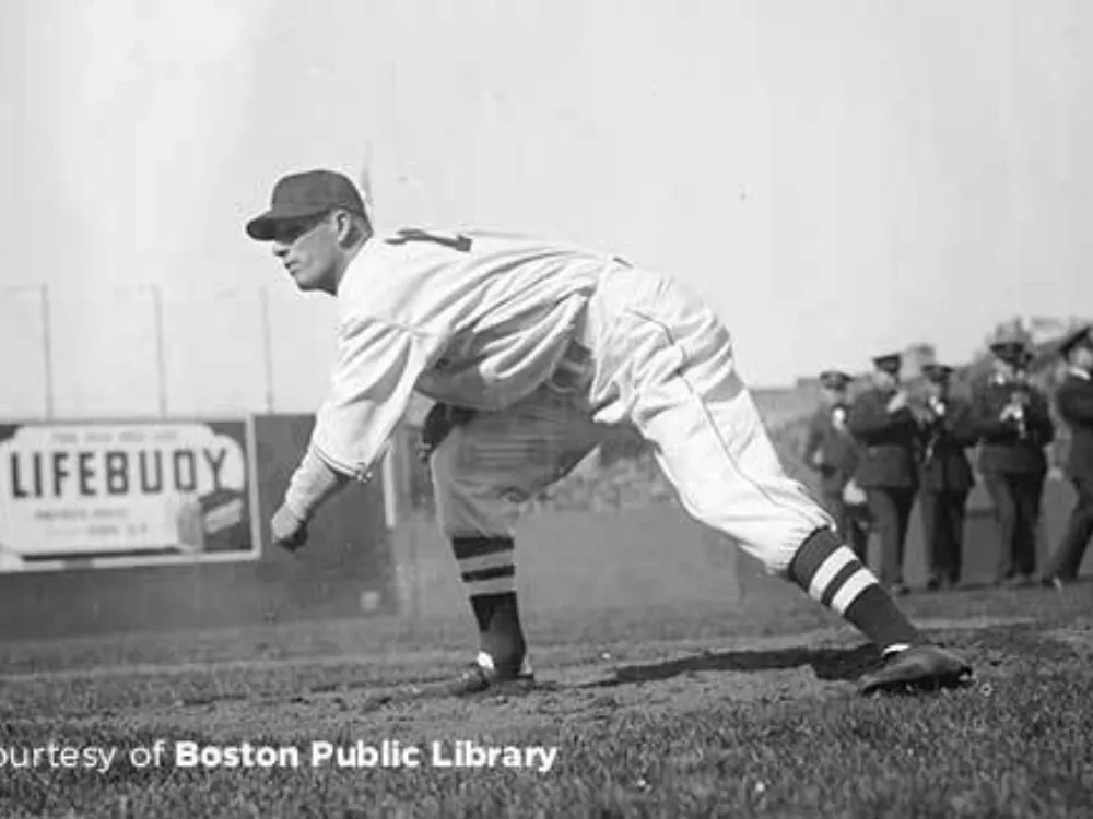 Vintage Fenway Park photo with billboard in the background