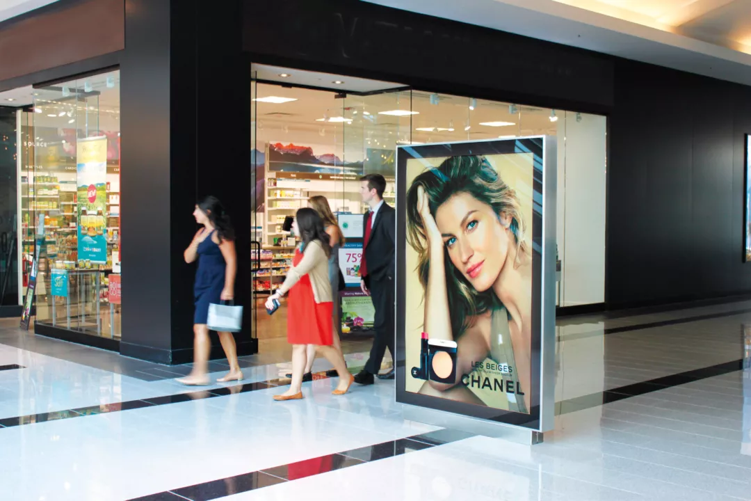 LED Backlit Freestanding Graphic Stand Inside of a Shopping Mall