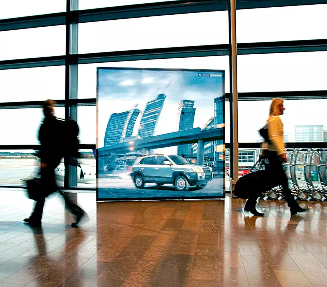 Collapsible Banner Stand With Custom Banner Inside of an Airport