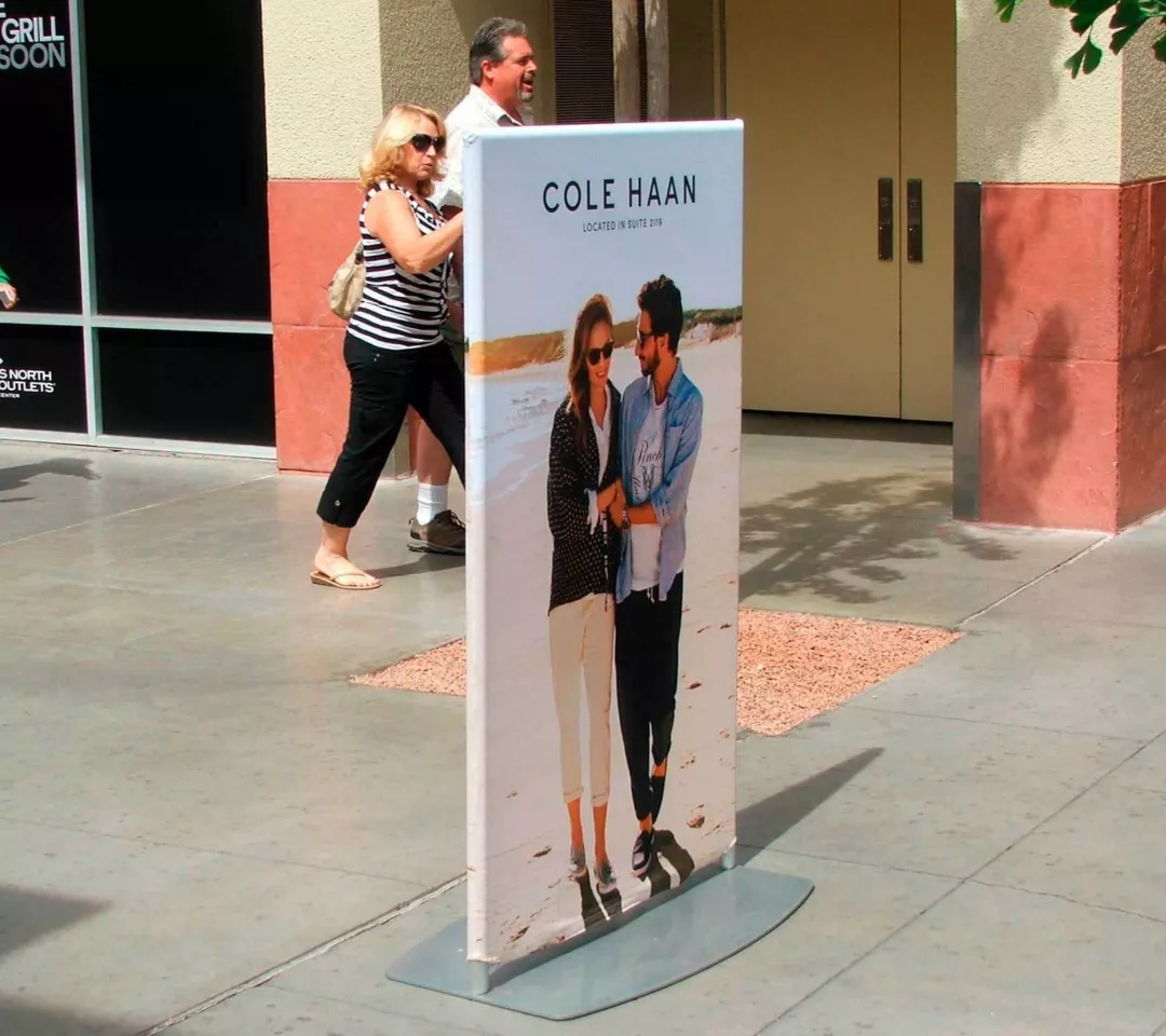 Exterior Pillowcase Banner Standee With Custom Graphics Outside at an Outlet Mall
